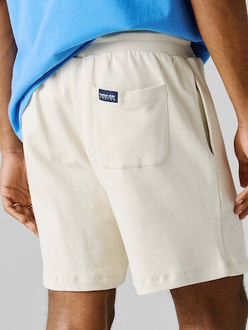 Red Bull Racing x Pepe Jeans Regular Trousers in Beige