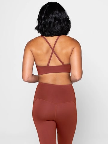 Girlfriend Collective Bustier Sport bh 'Topanga' in Oranje