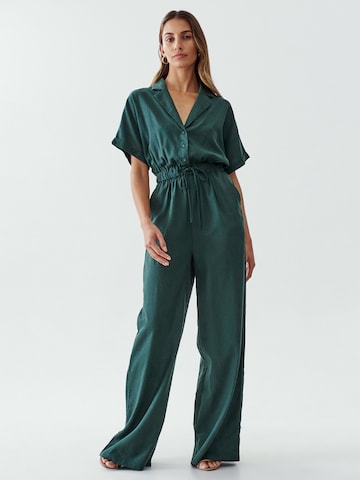 Calli Jumpsuit 'CONSCIOUS' i grön: framsida