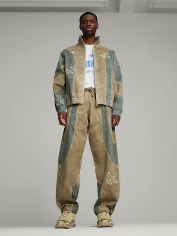 PUMA - regular Pantalón deportivo 'Puma X Kidsuper Track Pants' en beige