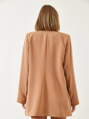 Completo pantalone di Bianco Lucci in marrone