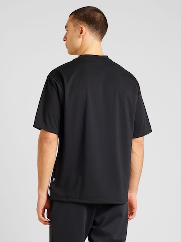 new balance - Camiseta en negro