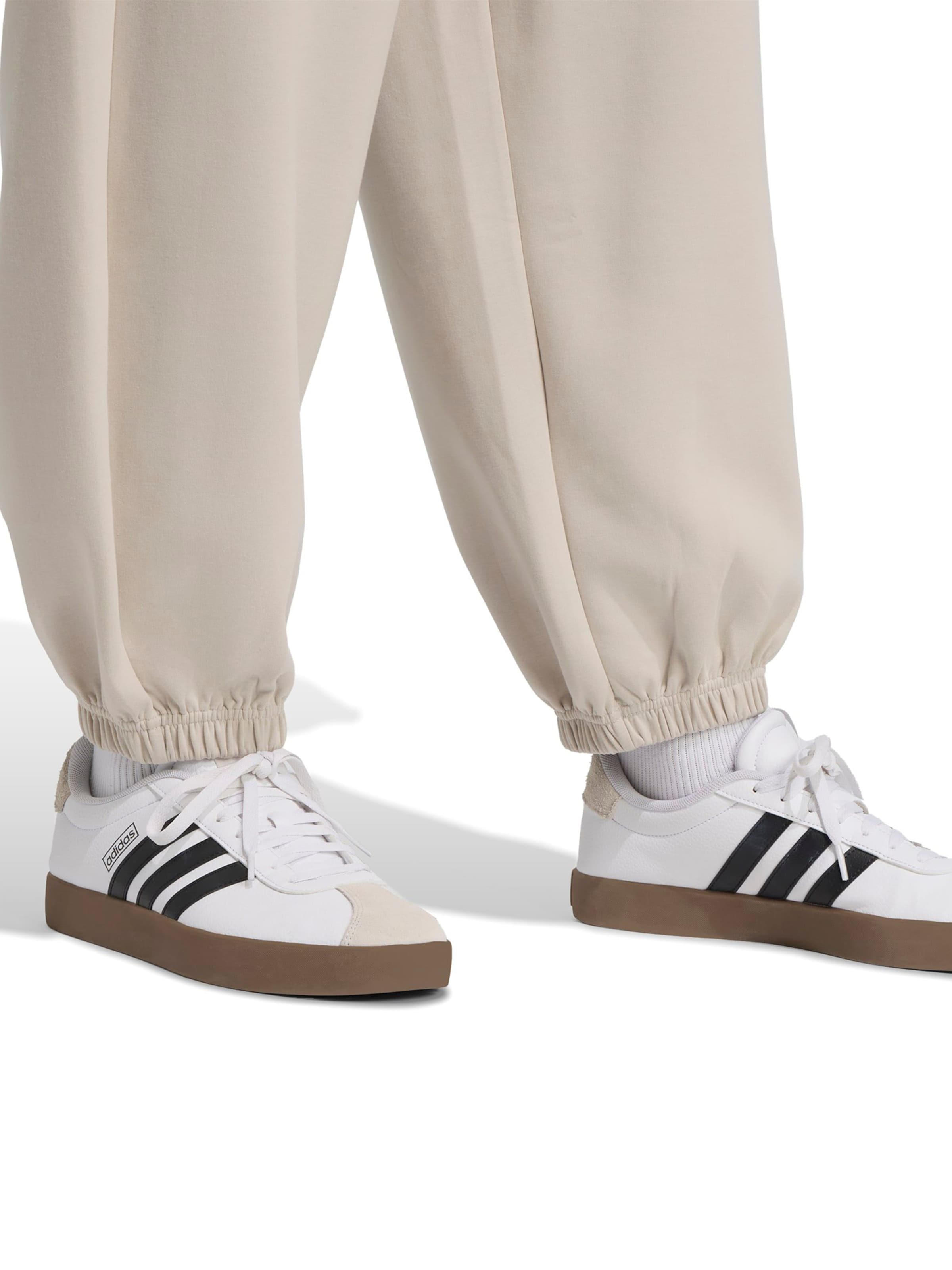 ADIDAS SPORTSWEAR Дънки Tapered Leg Спортен панталон 'Soft Luxe' в сиво