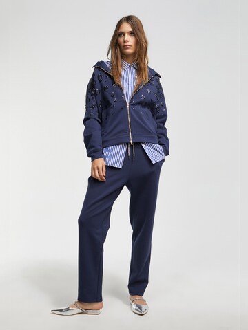 Lola Casademunt - Sudadera con cremallera en azul