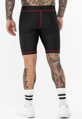 Tapout Skinny Toiminnalliset housut ' PENDANT ' värissä musta