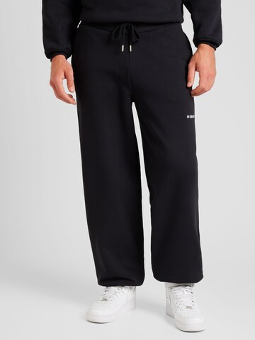 Han Kjøbenhavn Tapered Trousers 'Daily' in Black: front