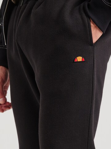ELLESSE Конический (Tapered) Штаны в Черный
