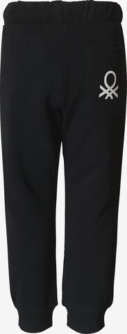 UNITED COLORS OF BENETTON Tapered Hose in Schwarz