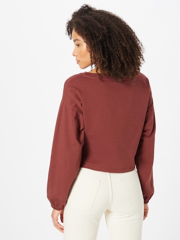 Sweat-shirt 'Marina' ABOUT YOU en marron