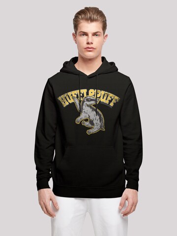 Felpa 'Harry Potter Hufflepuff Sport Emblem' di F4NT4STIC in nero: frontale