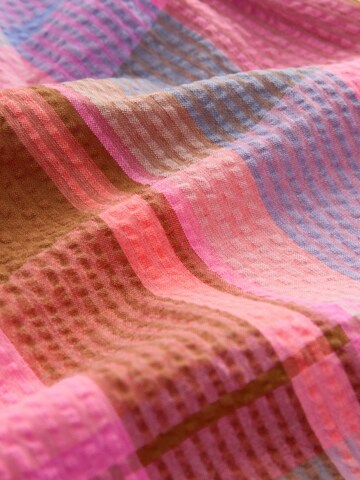 Tuta di Next in rosa