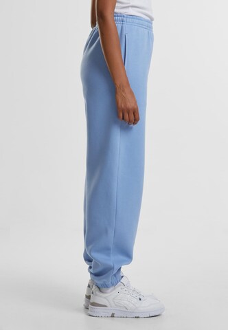 Tapered Pantaloni di Urban Classics in blu