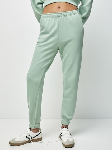 Pull&Bear Zwężany krój Spodnie w kolorze zielony: przód