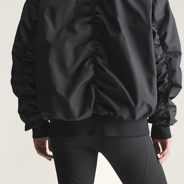 ADIDAS BY STELLA MCCARTNEY Αθλητικό μπουφάν ' Woven Bomber' σε μαύρο
