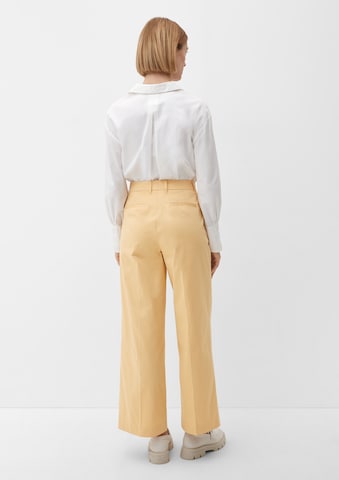 Wide leg Pantaloni con pieghe di s.Oliver BLACK LABEL in giallo