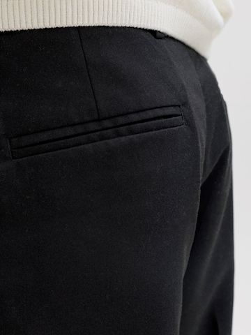 aprel - Pierna ancha Pantalón de pinzas en negro