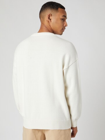 Pull-over 'Lemon' Kosta Williams x About You en blanc