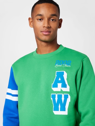 JACK & JONES Sweatshirt 'WORLD' in Green