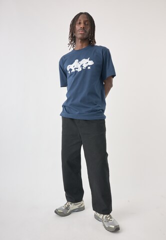 T-Shirt Cleptomanicx en bleu