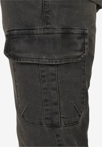 Tapered Jeans cargo di Urban Classics in nero