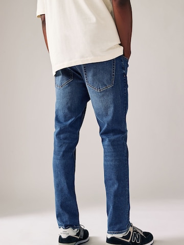 Next Skinny Jeans 'Essential' in Blue
