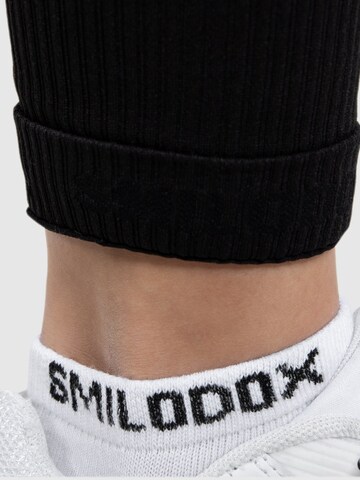 Smilodox Skinny Sportbroek in Zwart