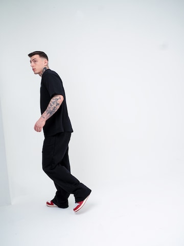 Maglietta 'SAINT TEE' di ATELIER OF FAITH in nero