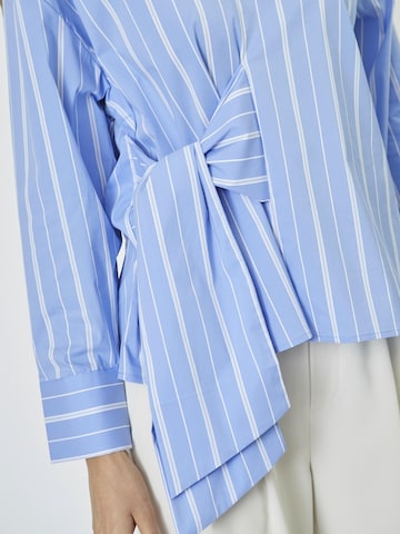Chemisier 'Shira' co'couture en bleu