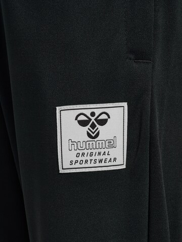 Effilé Pantalon de sport 'OZZY' Hummel en noir