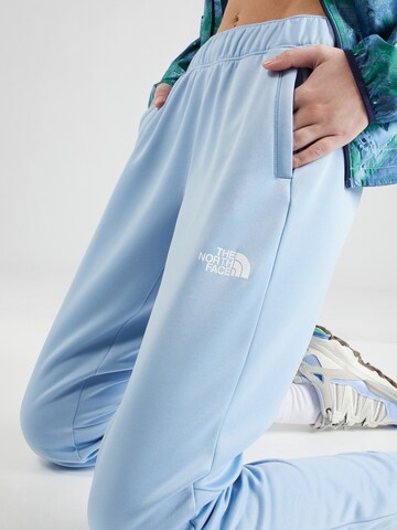 Tapered Pantaloni per outdoor 'REAXION' di THE NORTH FACE in blu