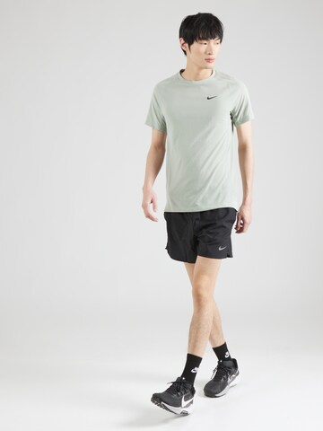NIKE Функциональная футболка 'FLEX REP' в Зеленый