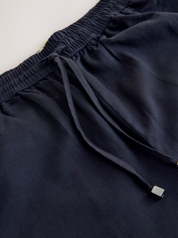 Tapered Pantaloni di Next in blu