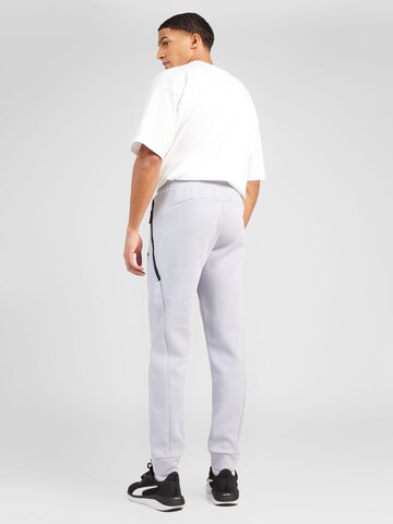 Tapered Pantaloni sport de la PUMA pe gri