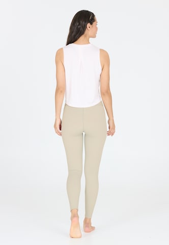 Athlecia Skinny Sports trousers 'FRANZ' in Brown