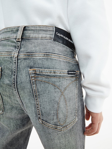 Calvin Klein Jeans Tapered Jeans in Grijs