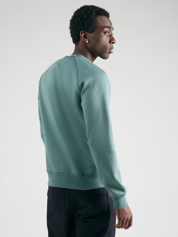 Carhartt WIP Sweatshirt 'Chase' i blå