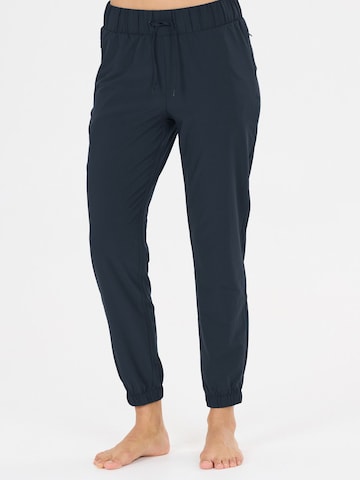 Athlecia - Tapered Pantalón deportivo 'Austberg' en azul: frente