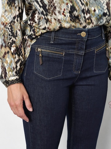 TONI Boot cut Jeans 'Be Loved' in Blue