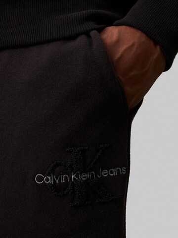 Effilé Pantalon Calvin Klein Jeans en noir