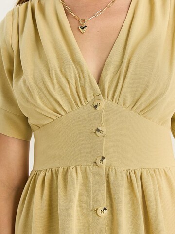 Bianco Lucci - Vestidos camiseiros em amarelo