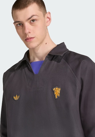 Sweat-shirt 'Manchester United Terrace Icons' ADIDAS ORIGINALS en noir