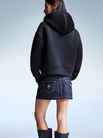 Bershka Collegetakki värissä musta