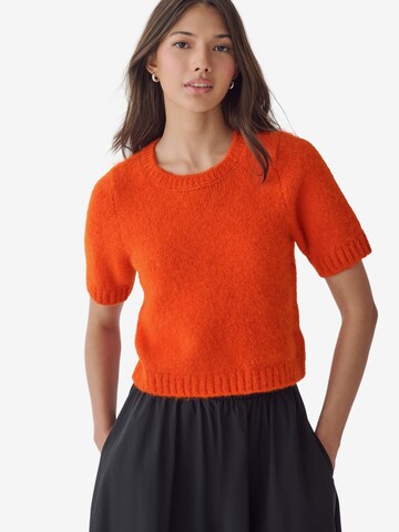 Next Tröja i orange: framsida