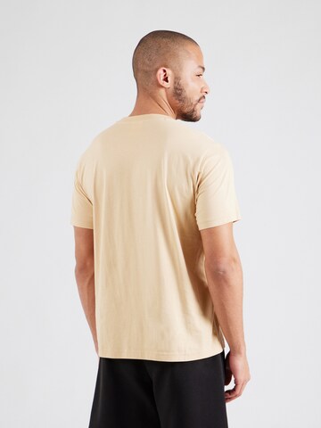 Maglietta di Champion Authentic Athletic Apparel in beige