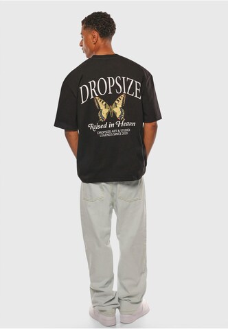 T-Shirt 'Raised In Heaven' Dropsize en noir
