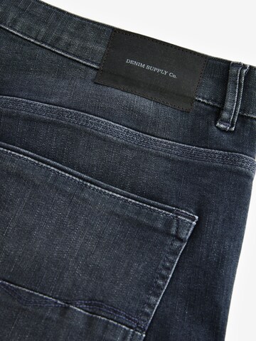 Next - Slimfit Vaquero en gris