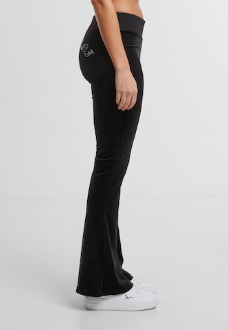 Regular Pantalon Karl Kani en noir
