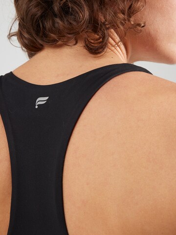 Fabletics Urheilutoppi 'ANYWHERE' värissä musta