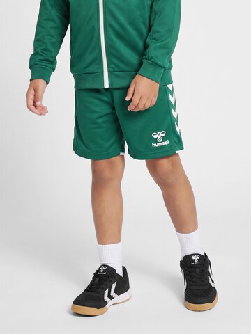 Hummel Regular Sports trousers in Green