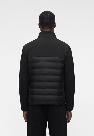 ELLESSE Between-Season Jacket 'Solzago' in Black